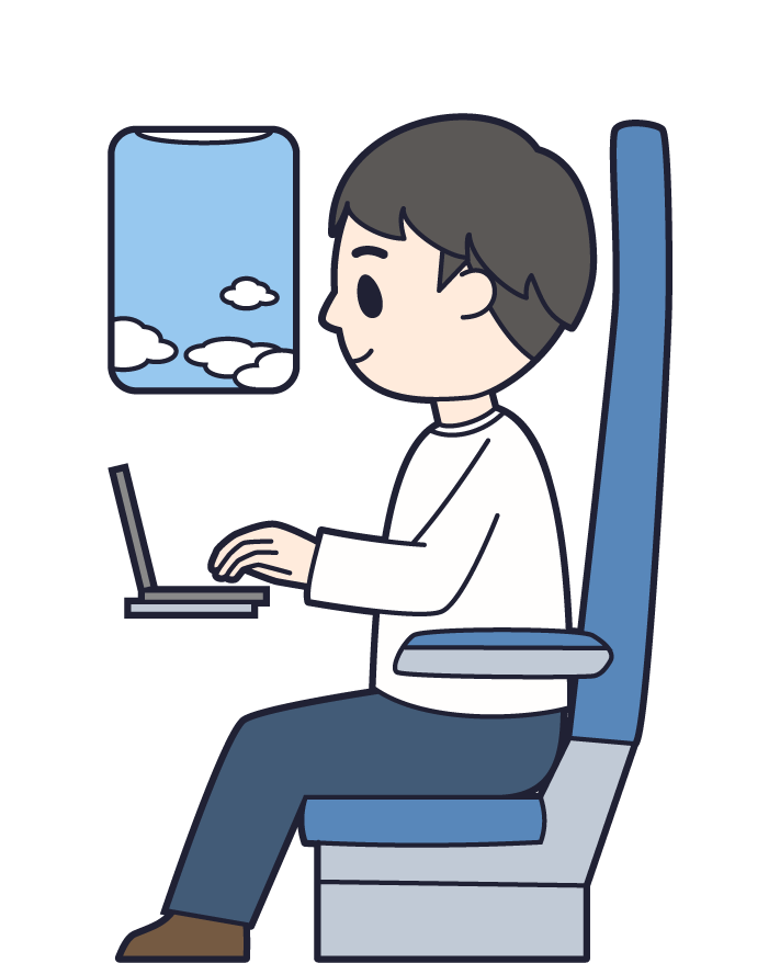 航空機の座席でパソコンを操作する男の画像